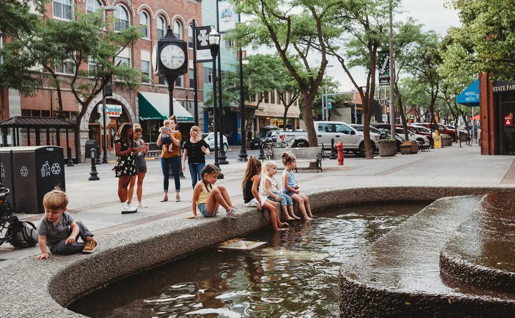 Children play in a fountain in downtown Moscow, Idaho