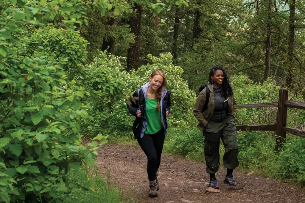Two women walking in the woods on Moscow, Idaho trails